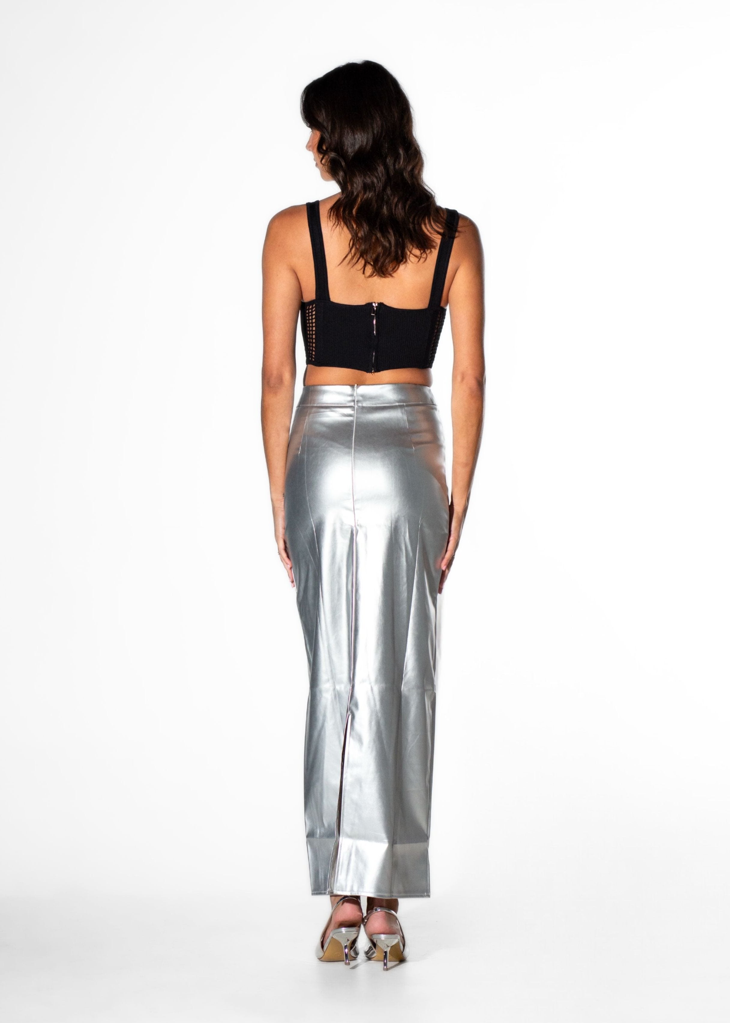 Back view of Laurenelle women’s black crochet knit bustier corset top highlighting a sleek design and fitted structure.