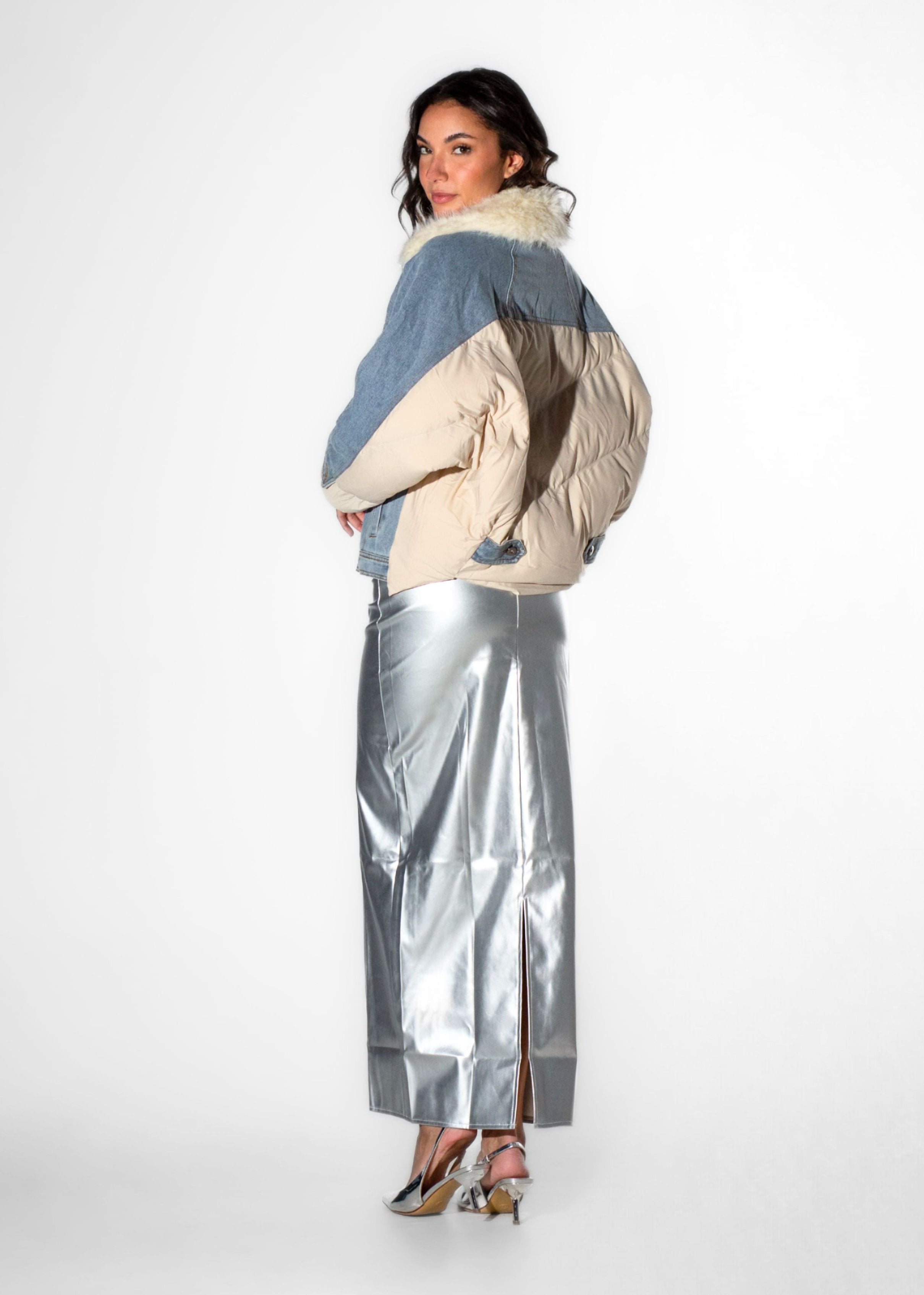 First side angle view of Laurenelle women’s denim color block puffer jacket featuring a khaki panel and faux fur collar.