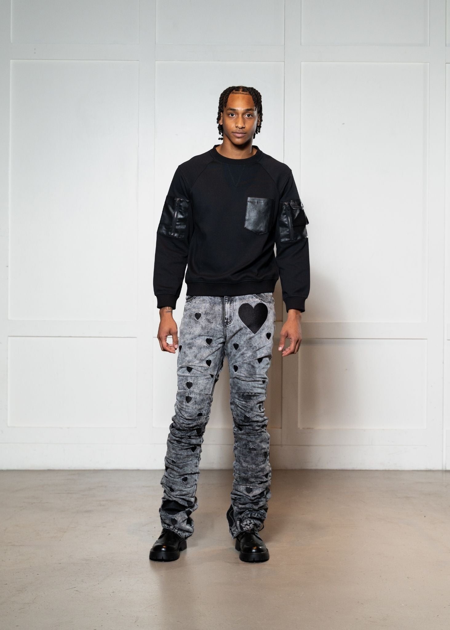 Laurenelle black heart stamped denim pants front view. Trendy and stylish statement denim.