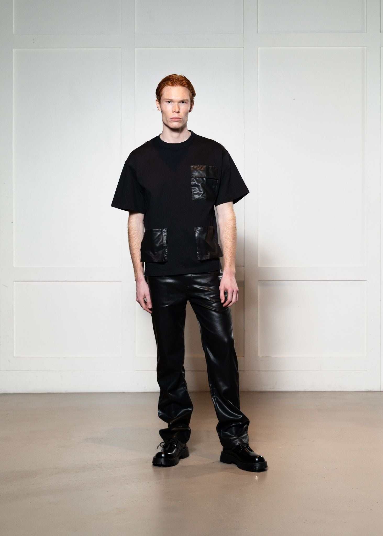 Laurenelle black vegan leather pocket tee front view. Modern and edgy casual style.