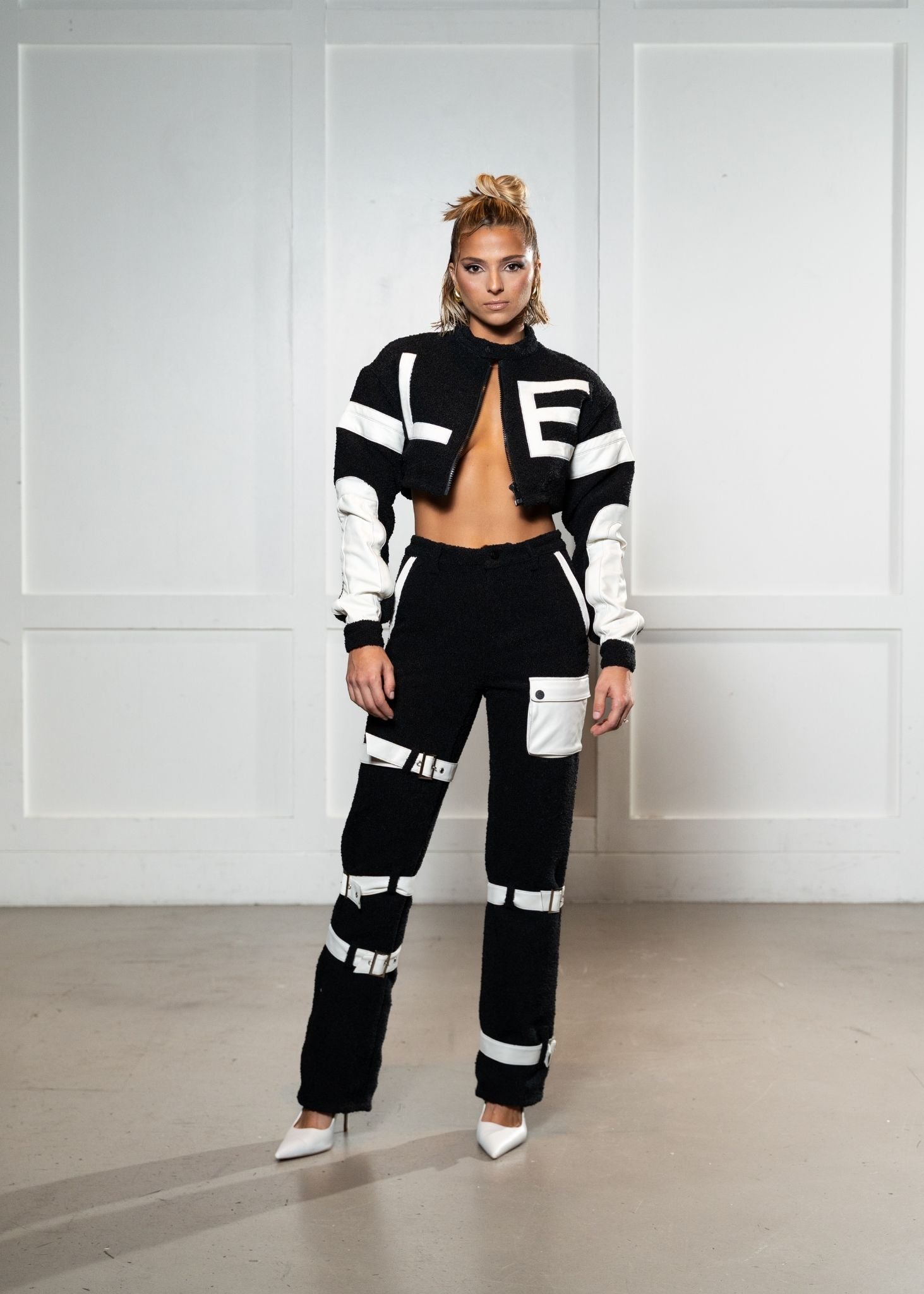 Laurenelle boucle and vegan leather set front view. Chic and sophisticated contemporary outfit.