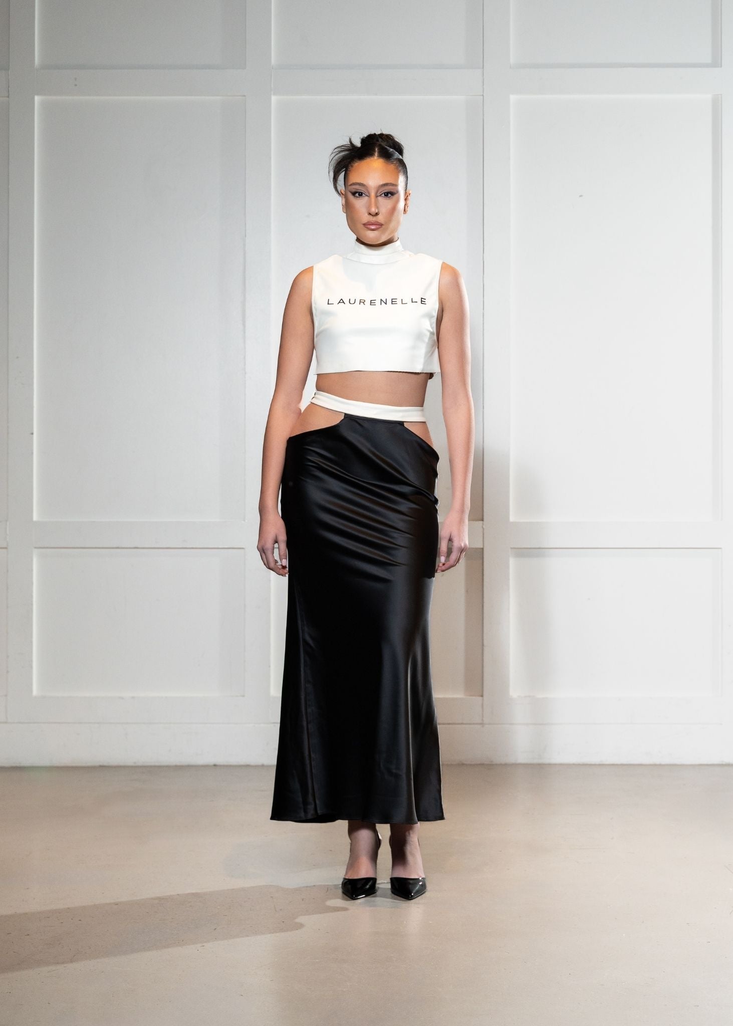 Laurenelle denim crop and black satin cutout skirt set front view. Chic and stylish contrast outfit.