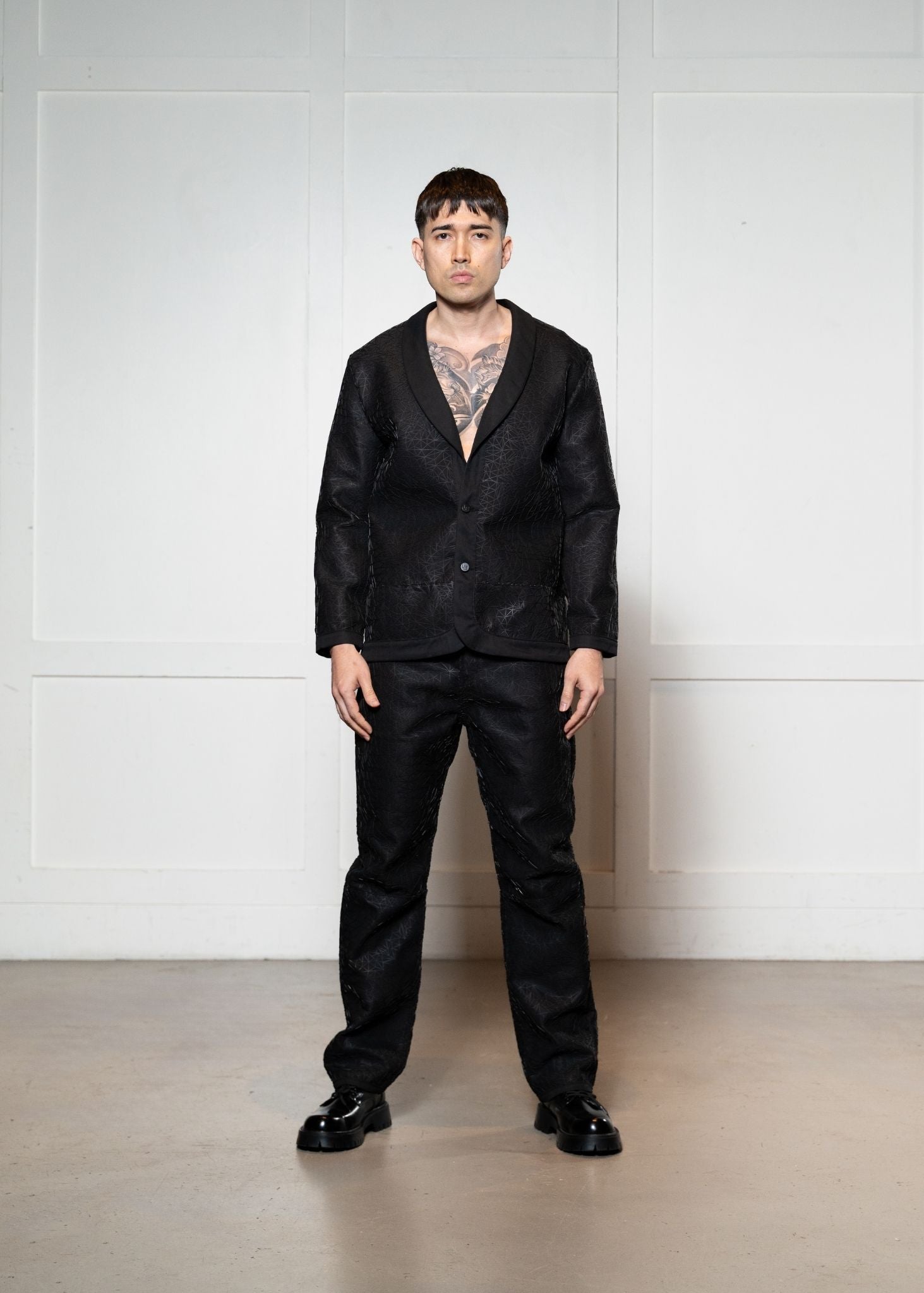 Laurenelle embroidered suit set in black front view. Elegant and sophisticated tailored design.