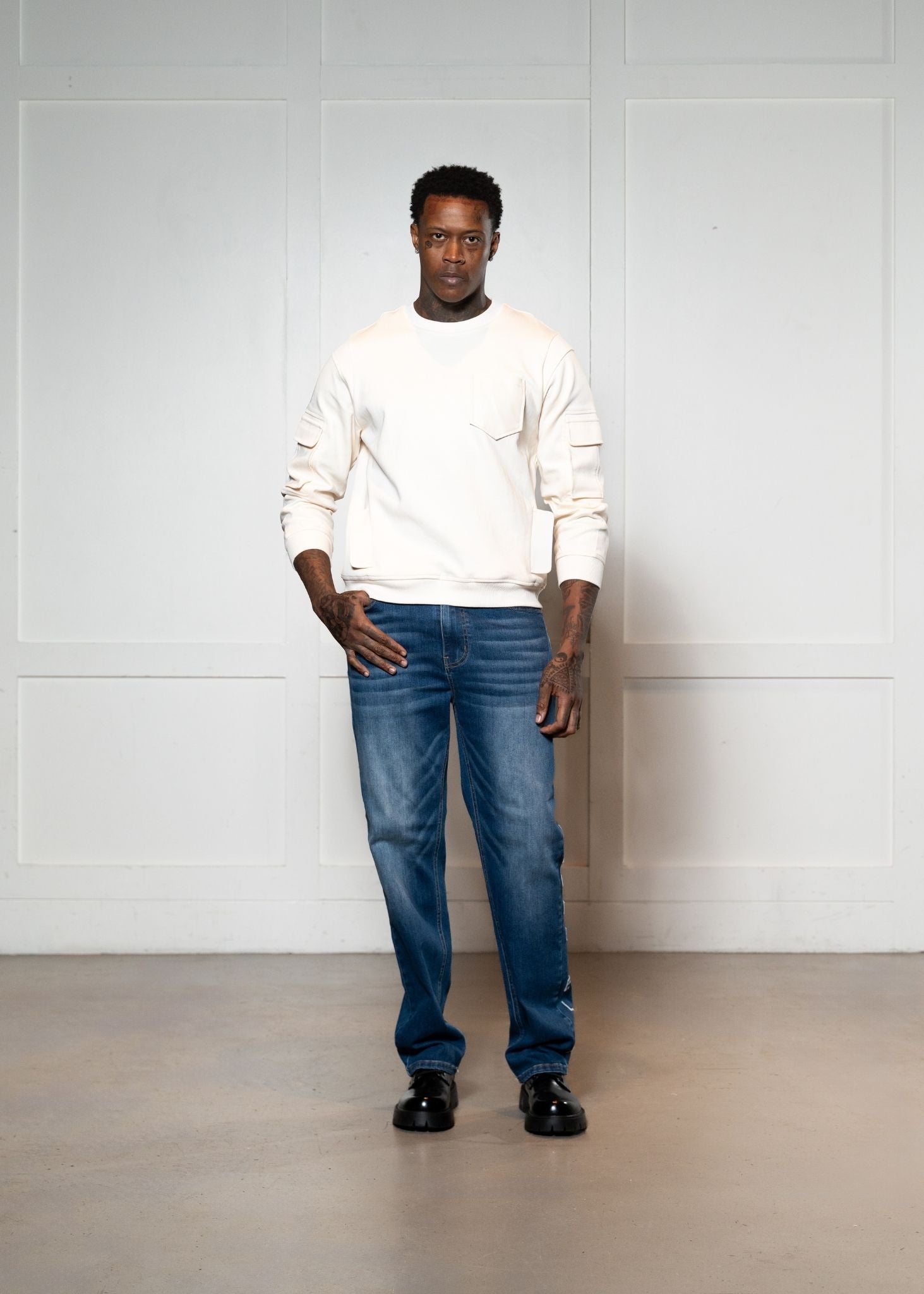 Laurenelle ivory vegan leather pocket sweatshirt front view. Modern and stylish casual wear.