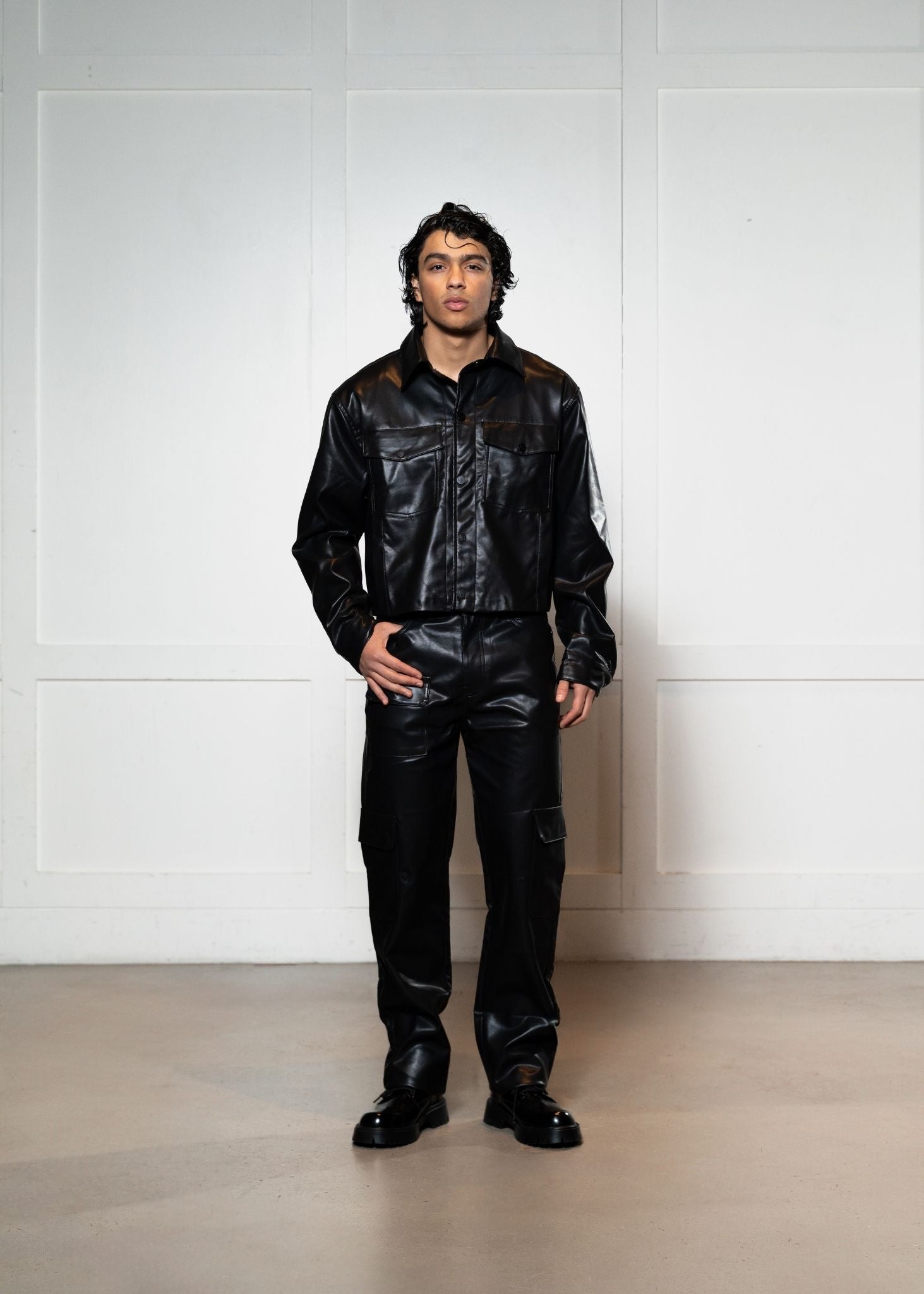 Laurenelle vegan leather two-piece set front view. Chic and sophisticated modern design.