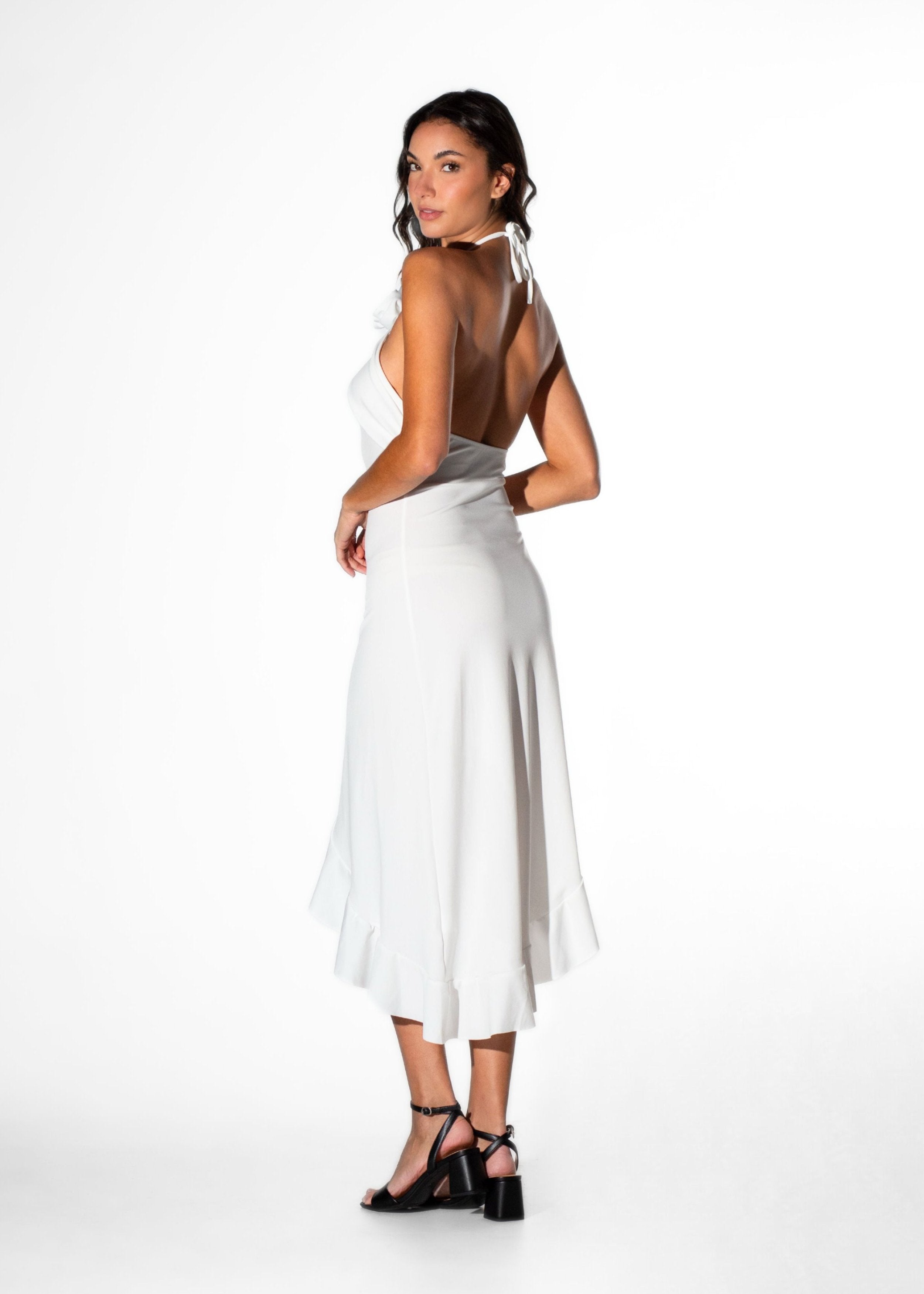 Side back angle view of Laurenelle women’s white long halter dress showcasing elegant florette details and halter neckline.