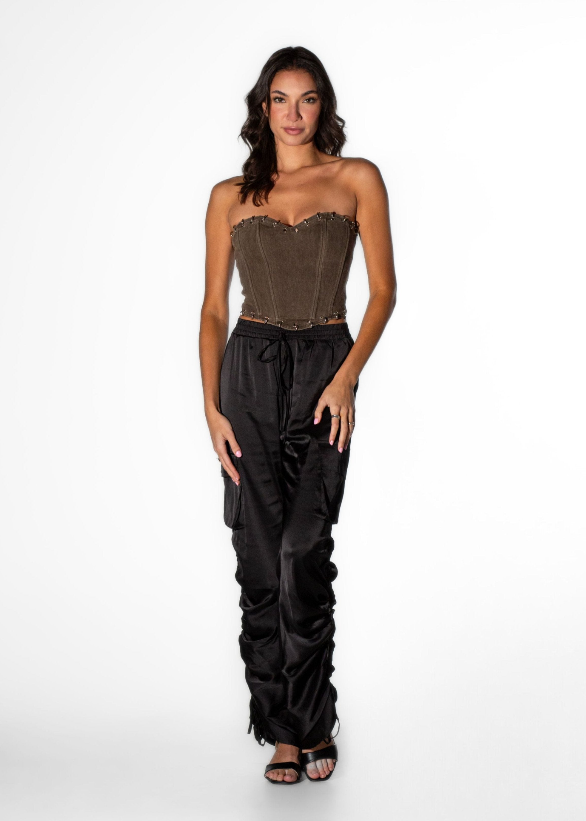 Front view of Laurenelle women’s brown pierced corset top featuring a structured design and cotton-blend fabric.