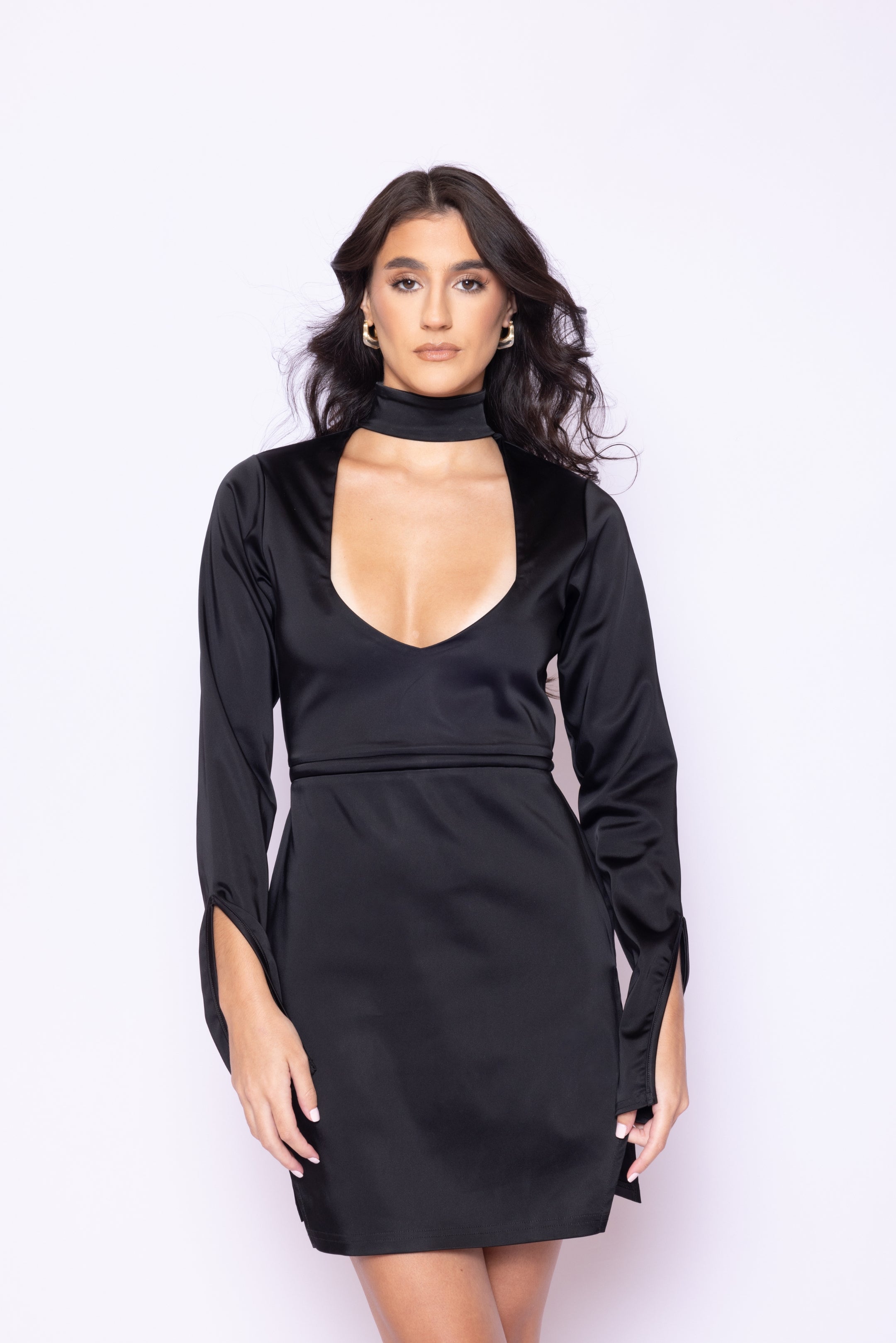 Cropped front view of Laurenelle women’s black plunging long sleeve dress with snap-off wrist strips and adjustable banded neck collar.