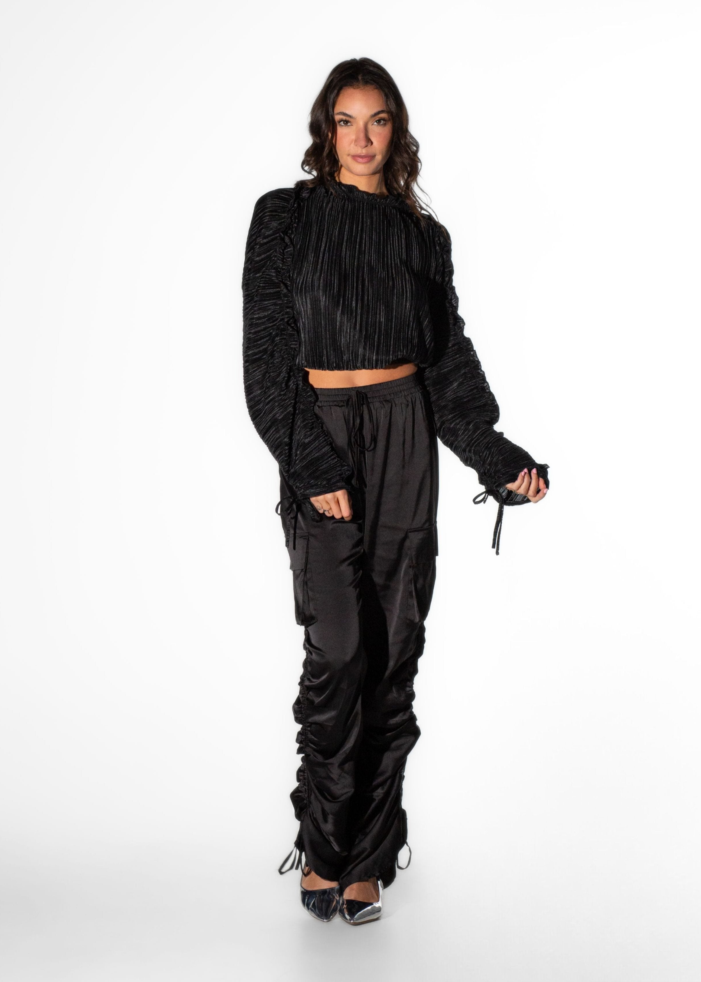 Front view of Laurenelle women’s black draw-string cargo pant featuring a ruched-leg design and soft sateen fabric.